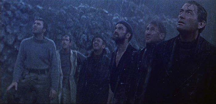 One impossible milestone down, now a 400 foot cliff in the rain.